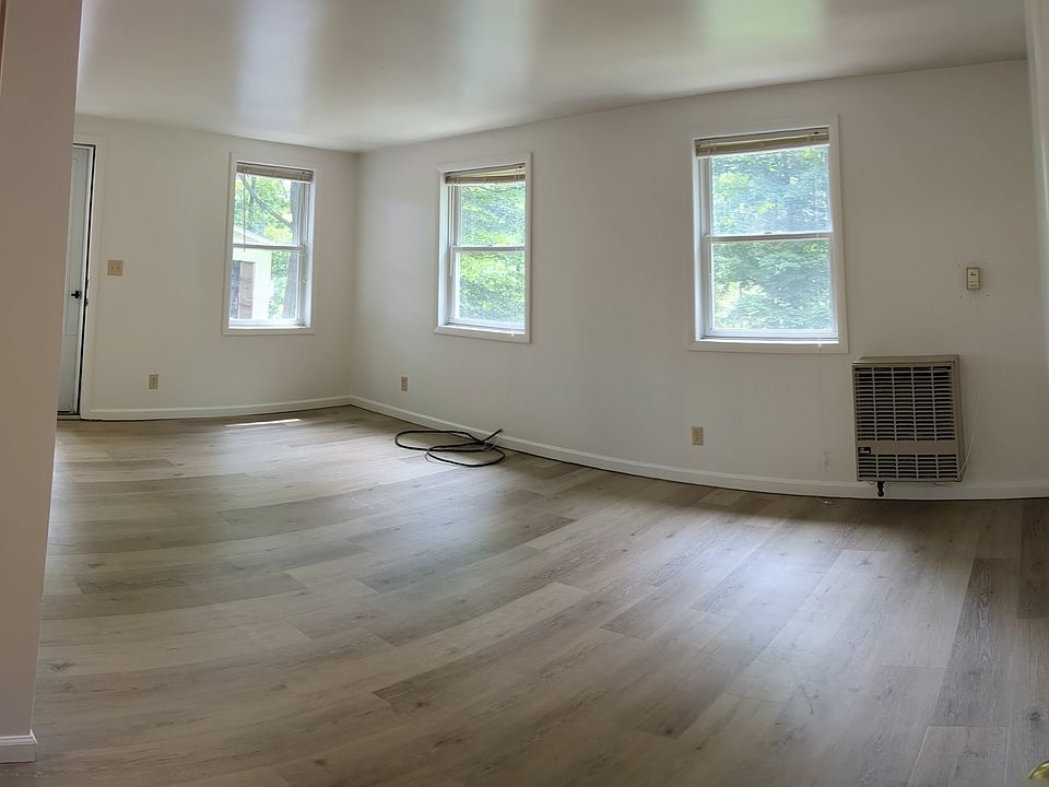 living room with propane heater