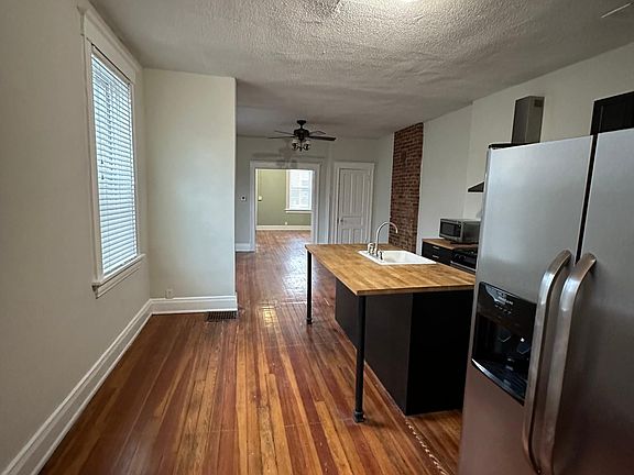 Kitchen looking towards dining area and living room/entry
