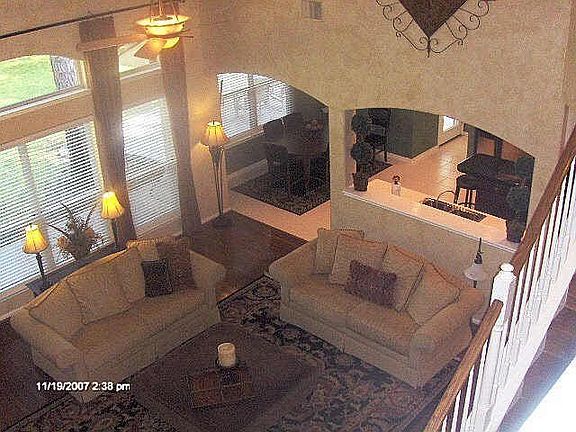 Soaring, open family room.  Decorator paint throughout.