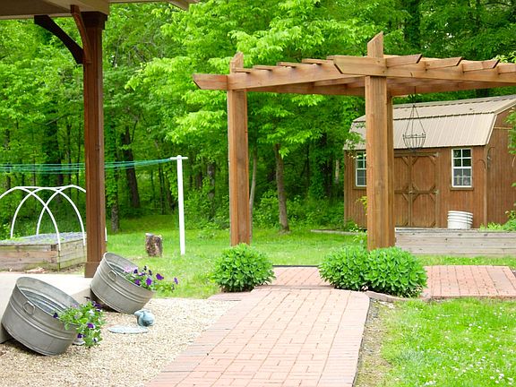 Pergola w/brick patio