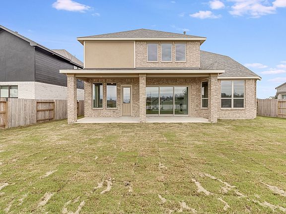 Come and see this spacious backyard with its beautiful covered patio. There is plenty of room for t