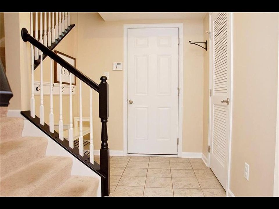 Entry Way - Access to Staircase, Office Room, Garage and Washer & Dryer Closet