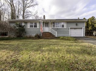 18 Riverside Dr, Pequannock, NJ 07440