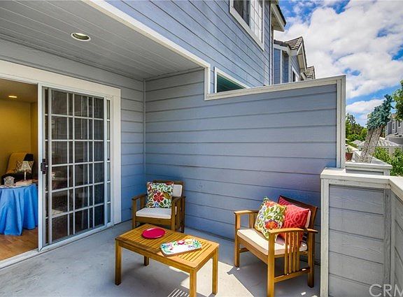 Notice the lovely, spacious patio as you walk up the stairs to the front door.