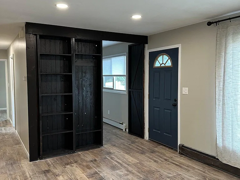Movable bookcase doorway to office/ small bedroom