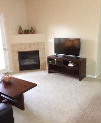 Living Room with Gas Fireplace and Deck