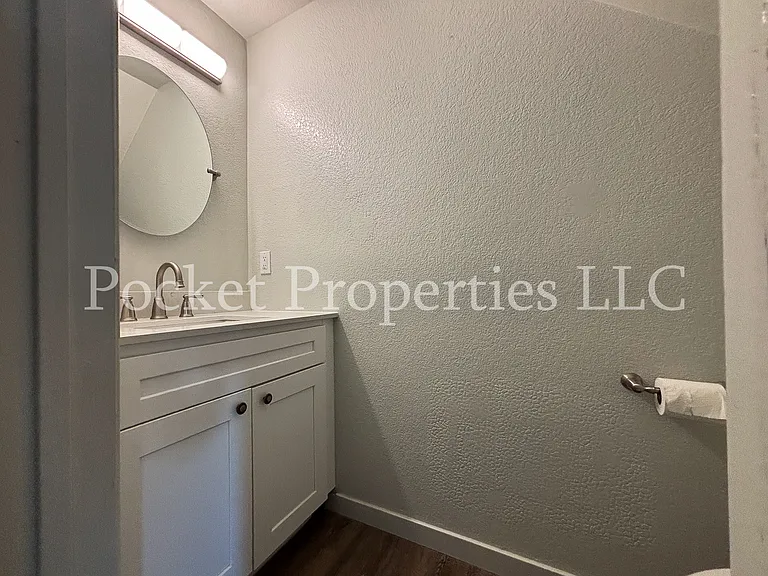 Main floor half bathroom (sink and toilet)