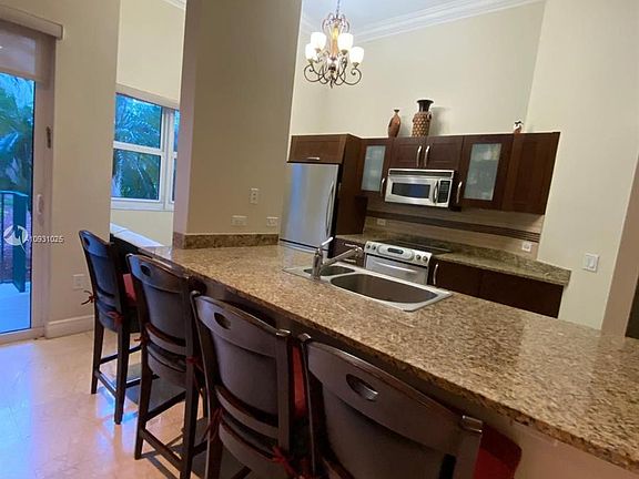4th image of 19900 E Country Club Dr APT 112