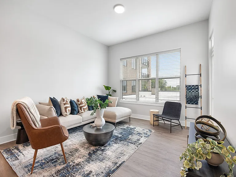 Bright living room with corner sofa