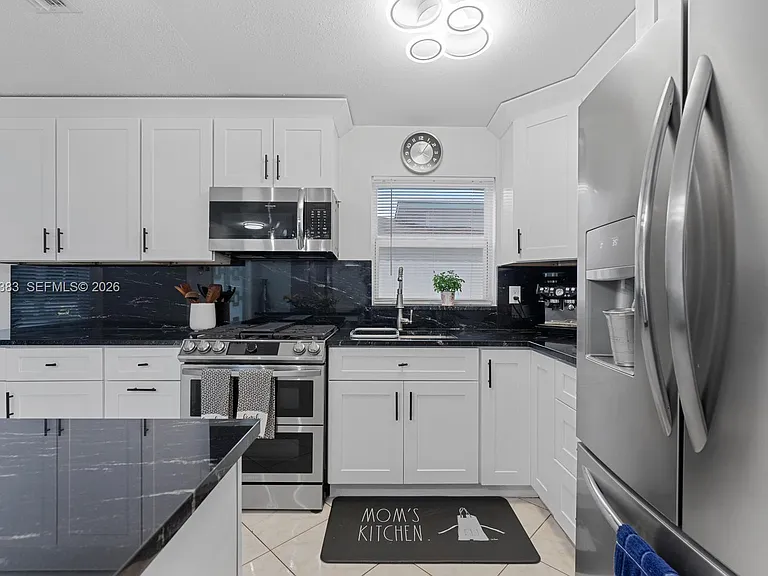 9508 N Military Trl — Photo 8