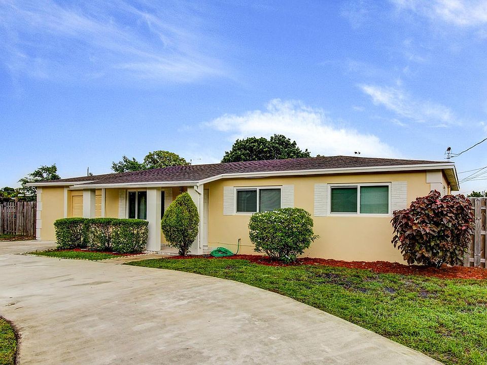 Front with circular driveway