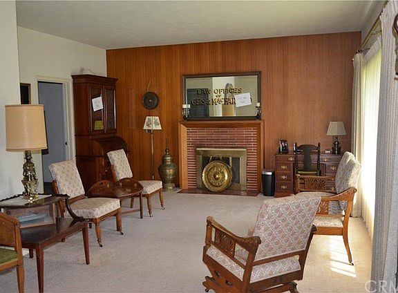 Living Room with picture window and built in hutch