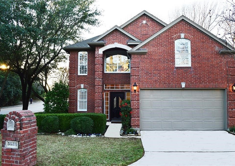 Graceful, Sprawling and heavily treed! This exceptionally Beautiful Home is tucked away in a prized and gated community!