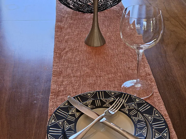 Service for 8 of dishes, silverware and glassware.