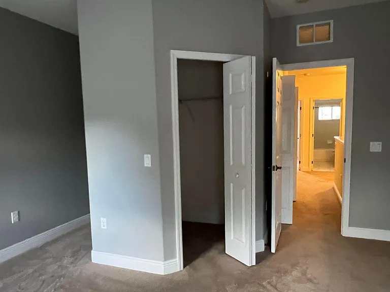 Master Walk-in Closet with Private Bathroom