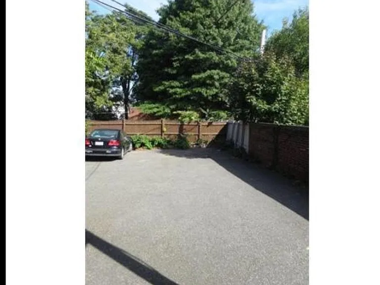 Parking lot in rear of building. One deeded parking spot included