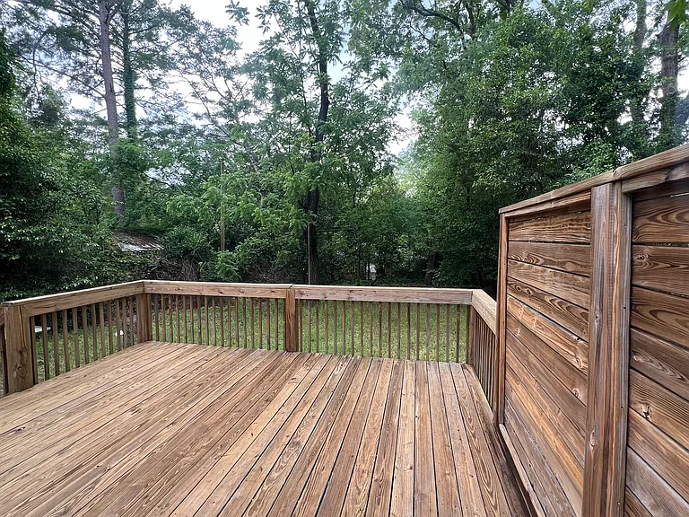 overlooks fully fenced and private backyard