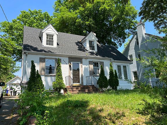 drive way on the left with parking on the back of the house for 2 cars