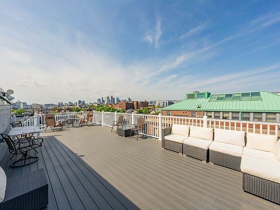 Large rooftop deck that overlooks Dorchester Street. This space is shared with other units in the building, but is generally not busy.