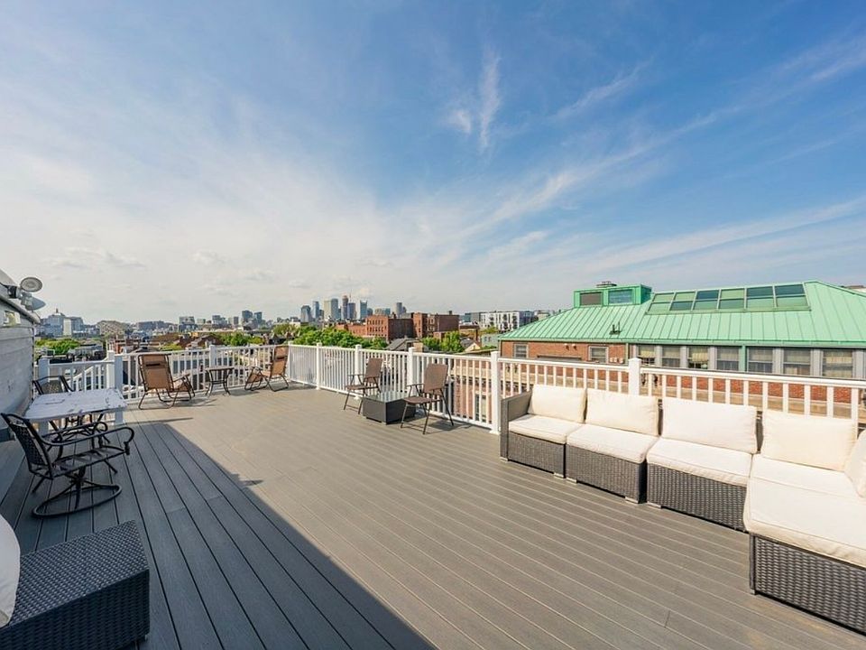 Large rooftop deck that overlooks Dorchester Street. This space is shared with other units in the building, but is generally not busy.