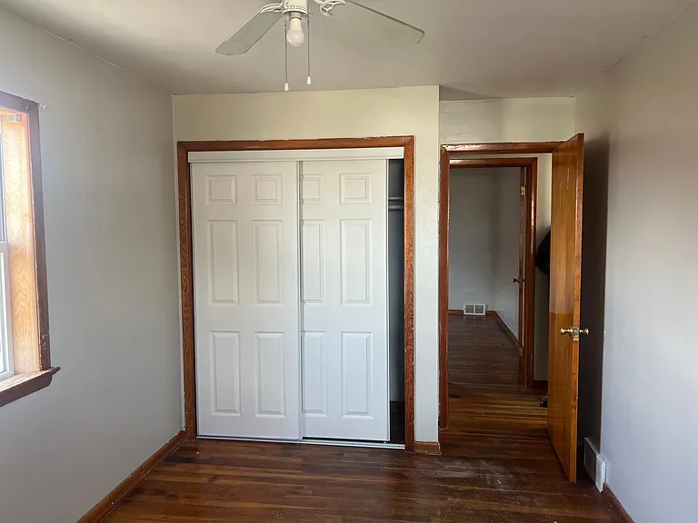 Room #4 door and walk in closet