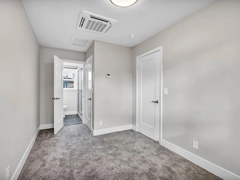 Bedroom with closet and bathroom