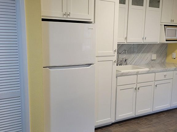 Kitchen with white appliances
