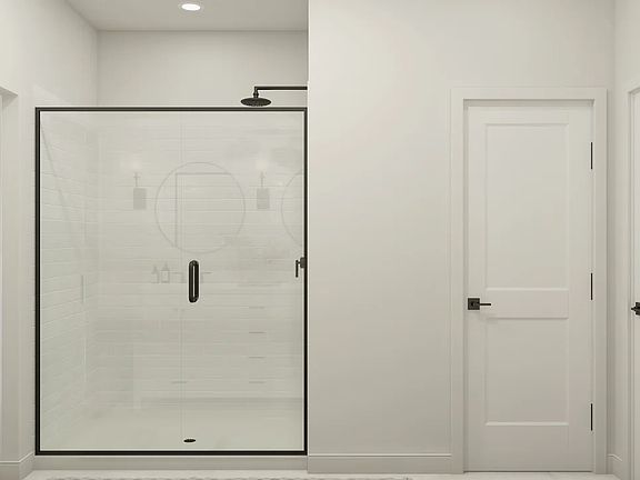 Primary bath with glass shower enclosure