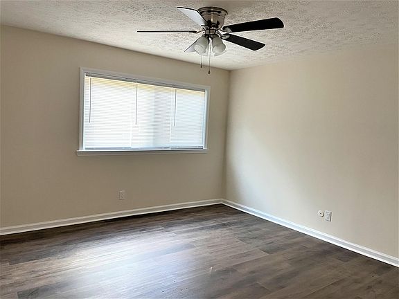 New flooring in spacious bedroom
