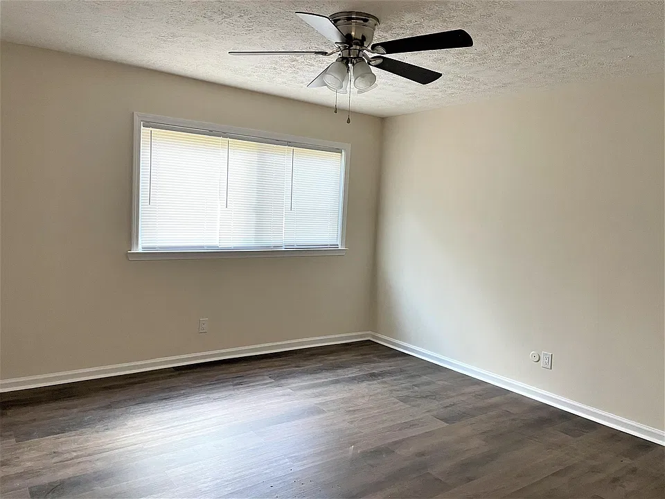 New flooring in spacious bedroom