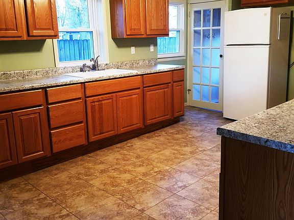 Kitchen, facing backdoor access