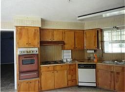 kitchen and breakfast area are combined and very large farm house stye