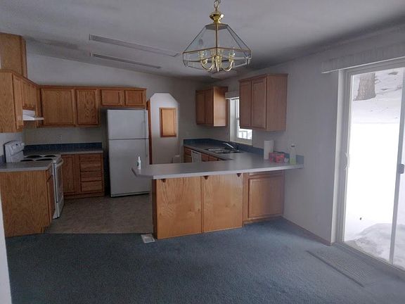 Looking through dining room into kitchen, from family room.