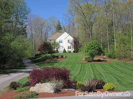 Front : Beautiful perennial gardens in front and back yard