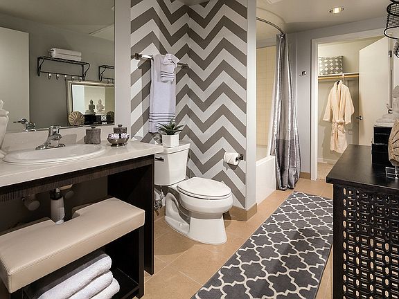Large bathroom with walk in closet.