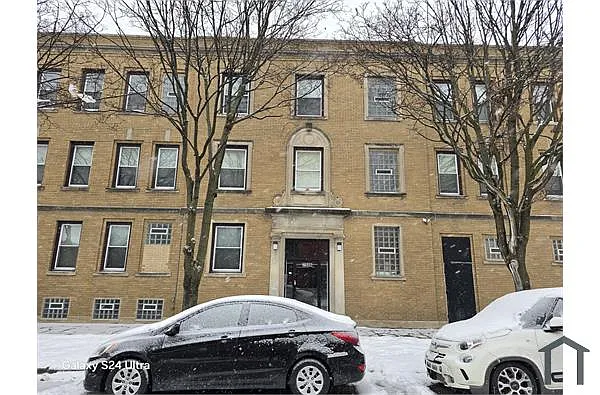 Building Photo - 7506 S Vernon Ave #3C