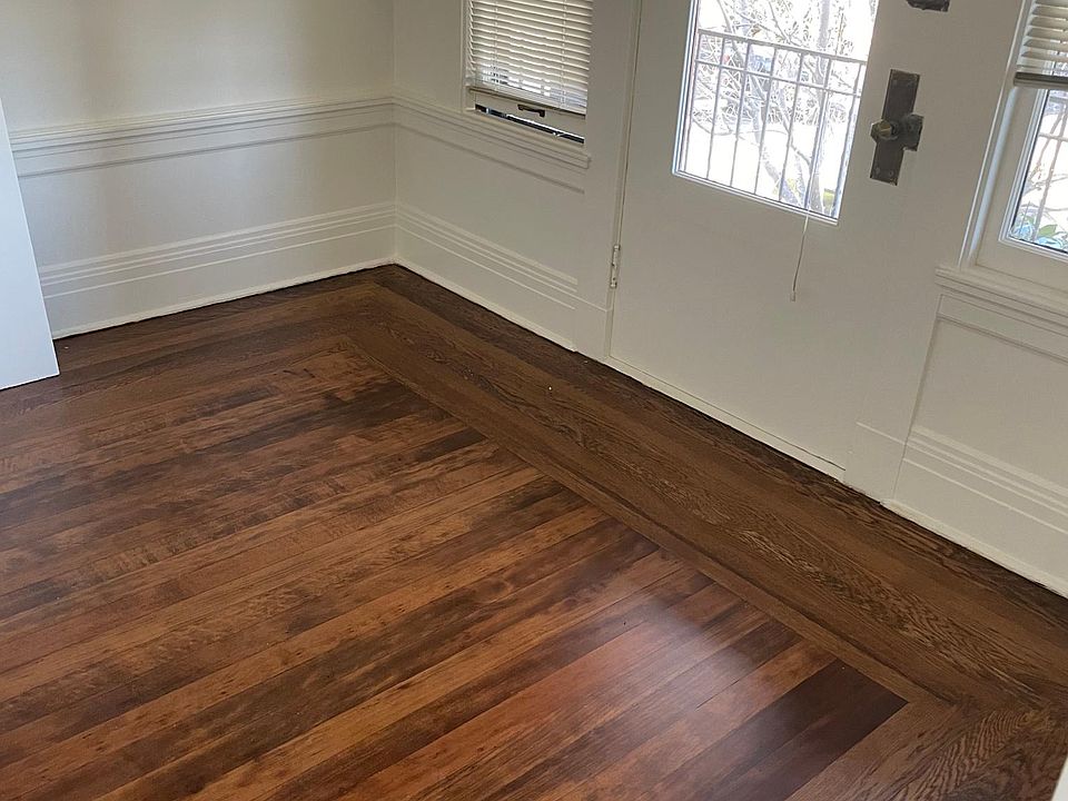 Living room and bedroom hardwood floors. Front deck