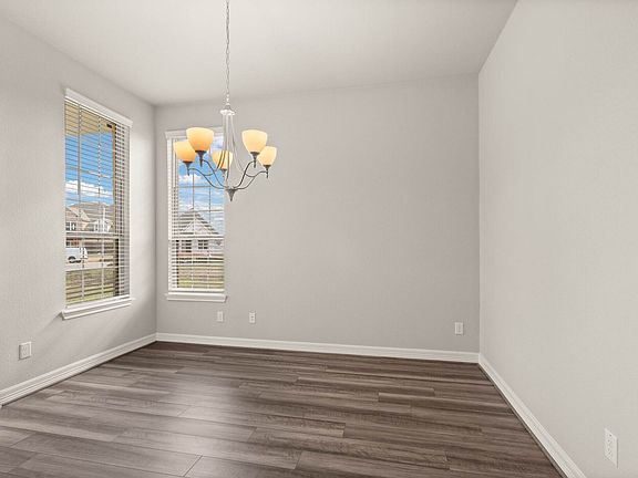 The dining area is a perfect blend of style and functionality, providing an inviting space for memor