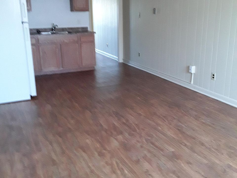 Open concept LR with vinyl planked floors