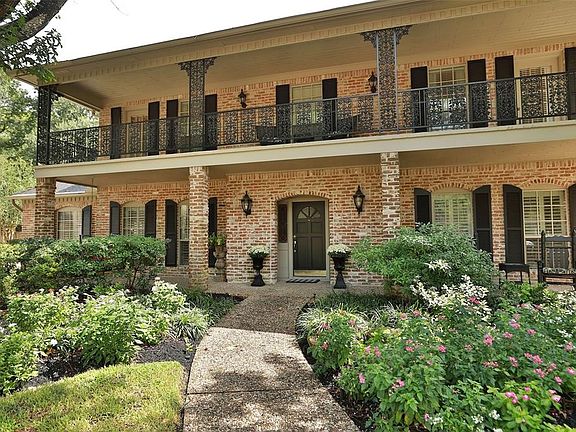 Gorgeous landscaping both front and back yard