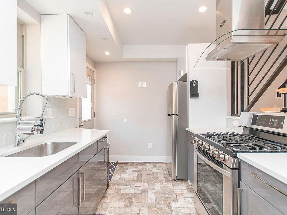 kitchen view as you walk into it. Door in back left is for the huge patio