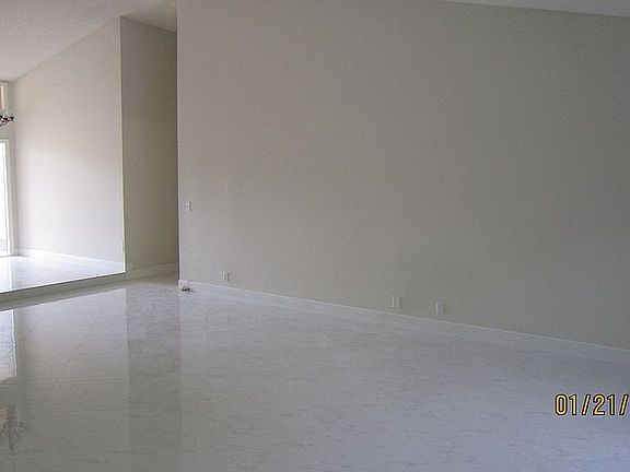 Foyer and partial livingroom
