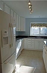 New kitchen with granite counters.
