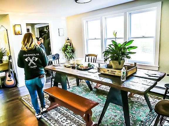Farmhouse Dining: Gather around the hand-built table that seats eight with ease.