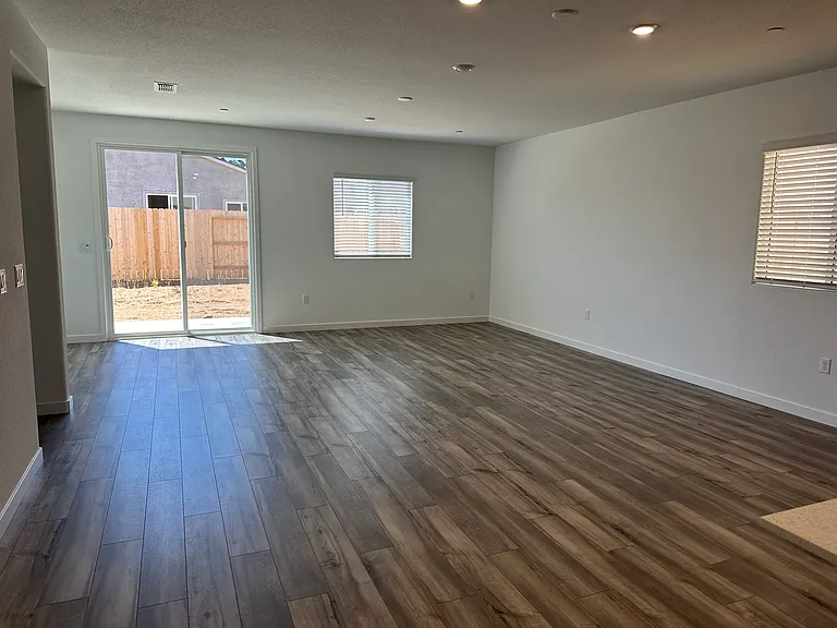 Open-concept spacious living area ideal for family gatherings and shared experiences.
