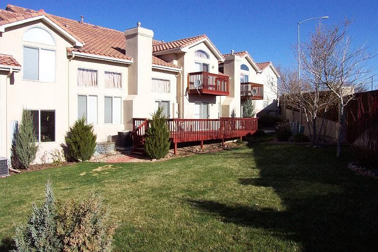 Back of unit with large deck and smaller deck off master sui