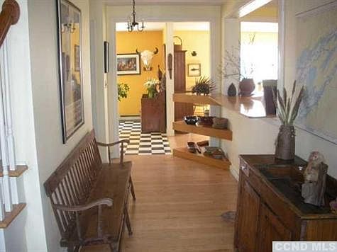 Spacious front entry hall. Hardwood flooring is throughout most of the house.