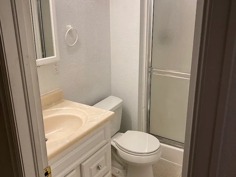 Basement 3/4 bath in between two bedrooms