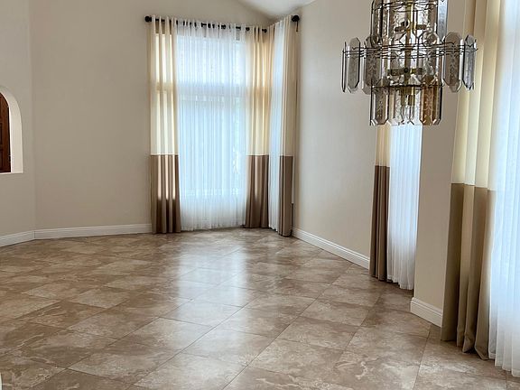 Formal living/dining room adjacent to staircase