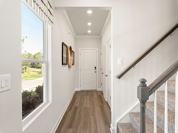Step inside the Dallas apos s, bright open-concept living space.